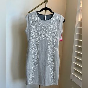 Stunning embossed filigree patterned bodycon dress.